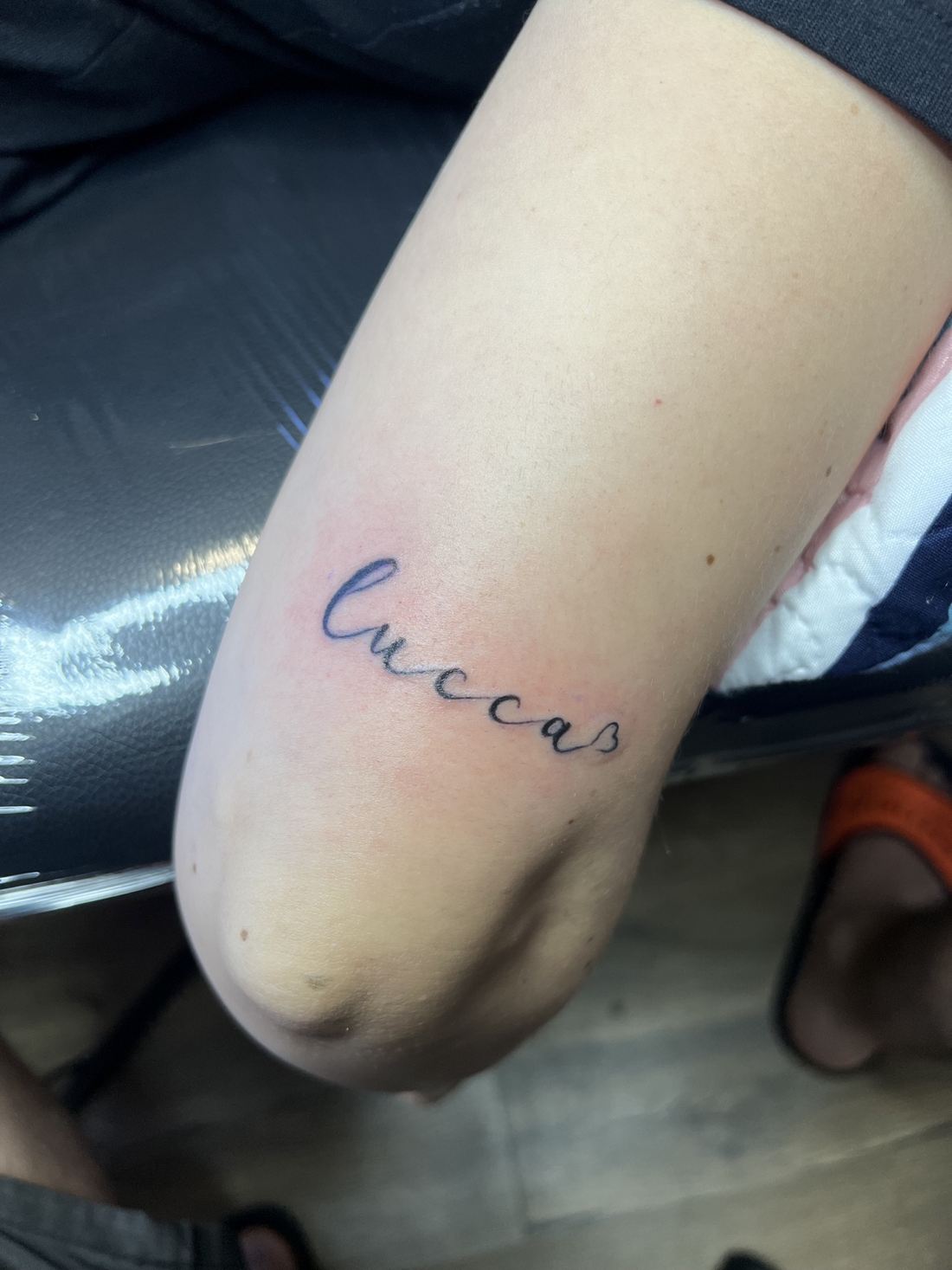 Tattoo: Fine line — “Luccas” script