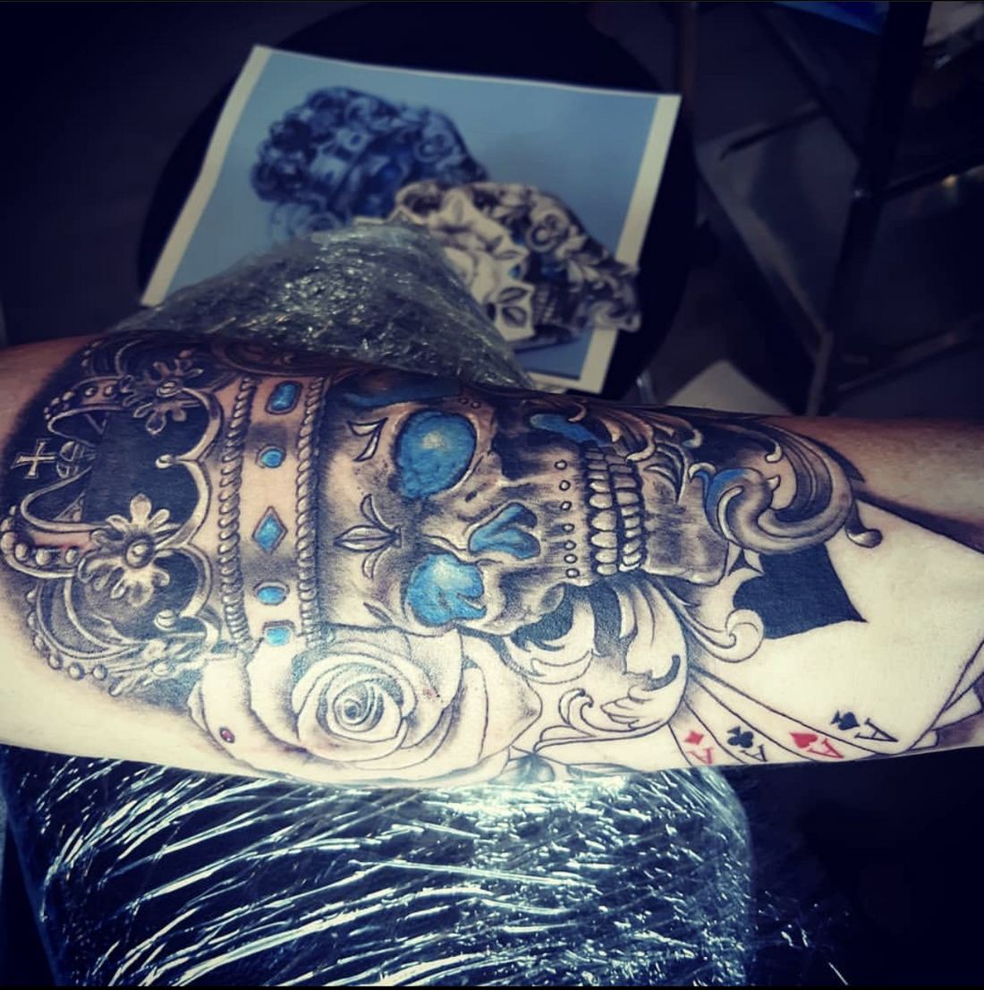 Tattoo: Color accents — Crowned skull and cards