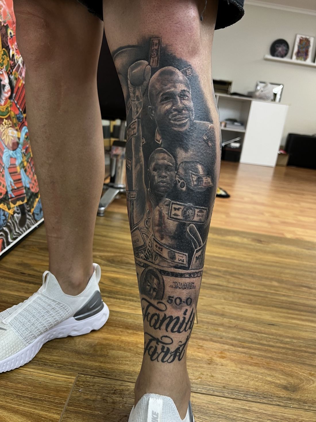 Tattoo: Black & grey portrait — Boxer and “Family First”